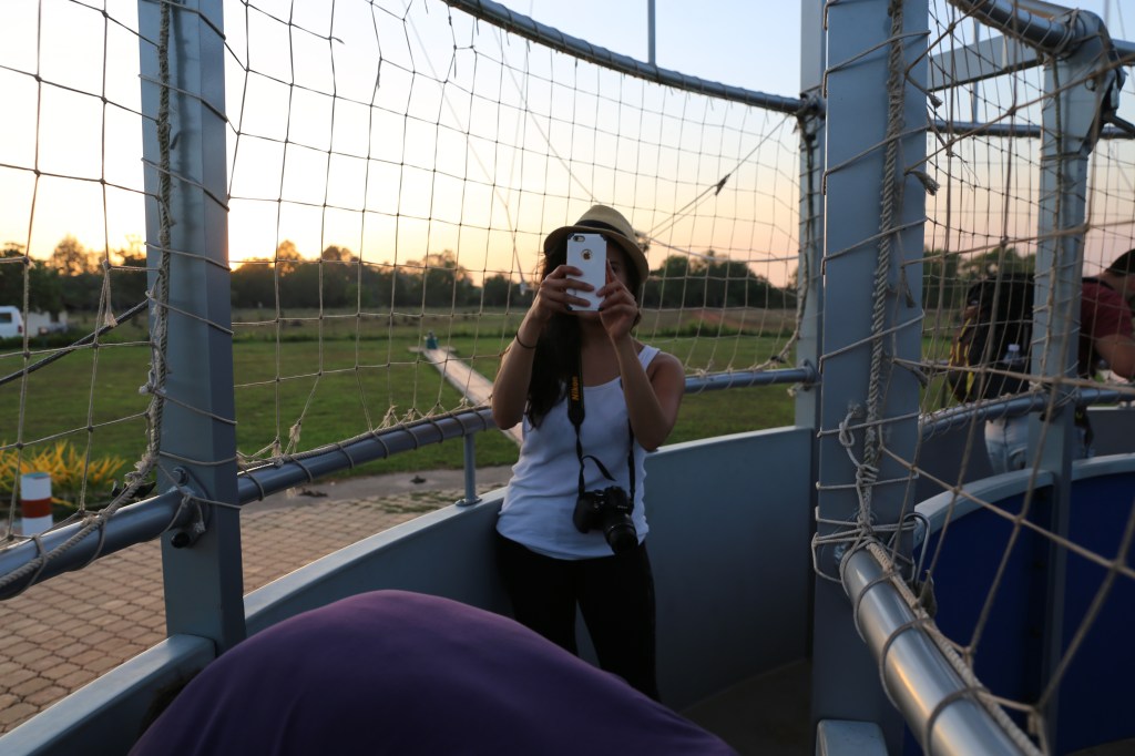 Me on the hot air ballon before sunset. You can never have too many cameras!
